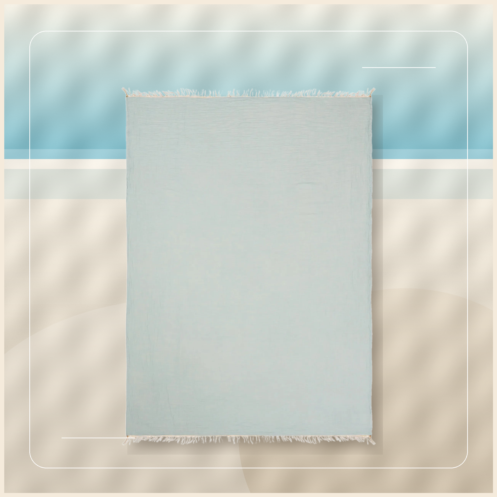 Laguna Coast Turkish Cotton Towel Throw styled on a quiet poolside coastal backdrop