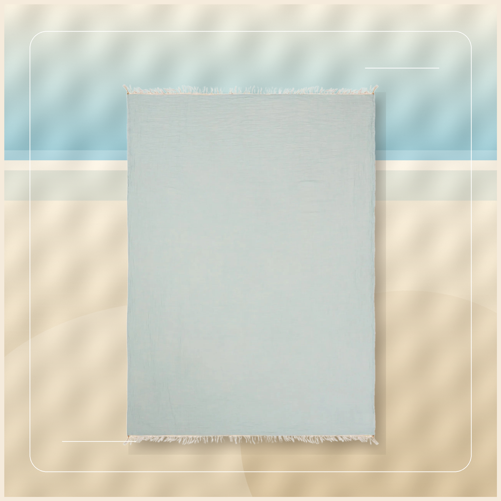 Laguna Coast Turkish Cotton Towel Throw styled on a high-resolution shoreline backdrop